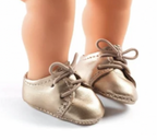 Chaussures dorées pour poupée -